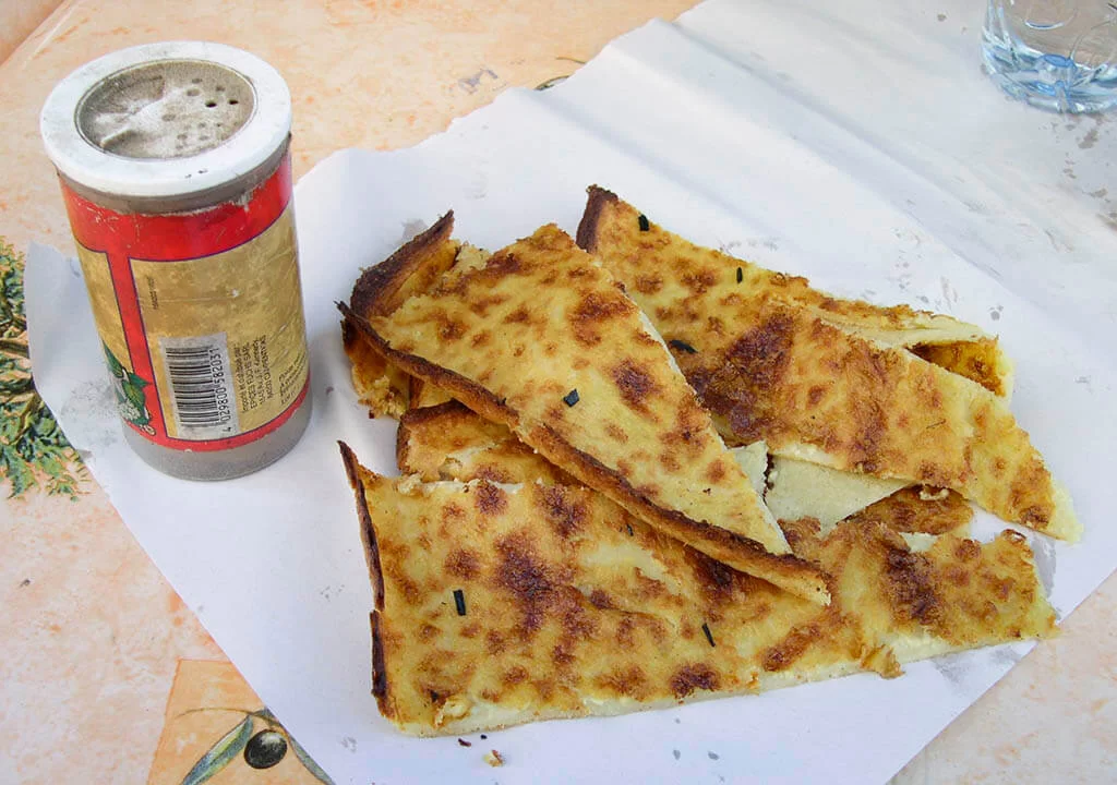 Probeer Socca in Nice Probeer Socca in Nice